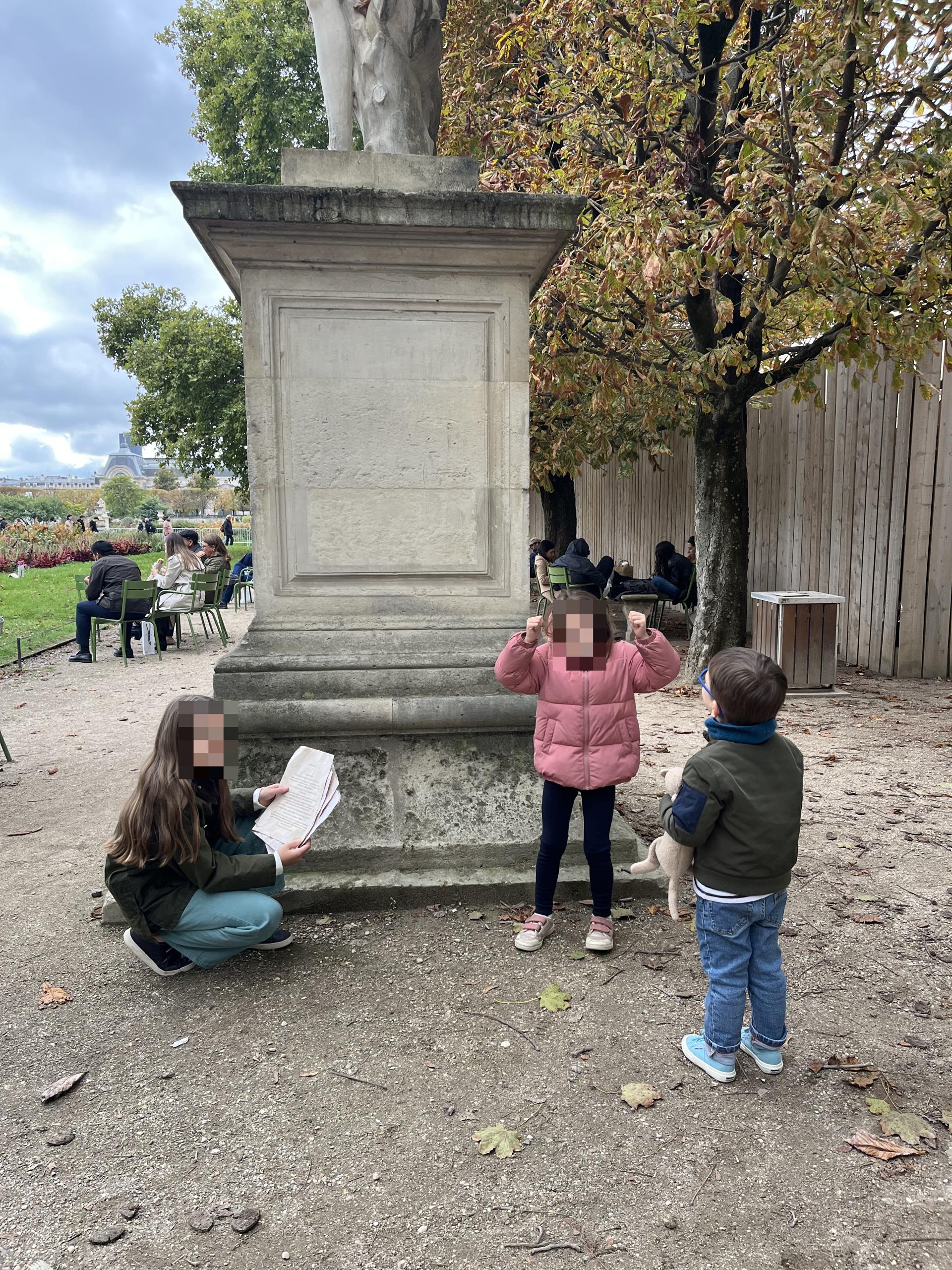 Children playing along on a path in the Tuileries Garden